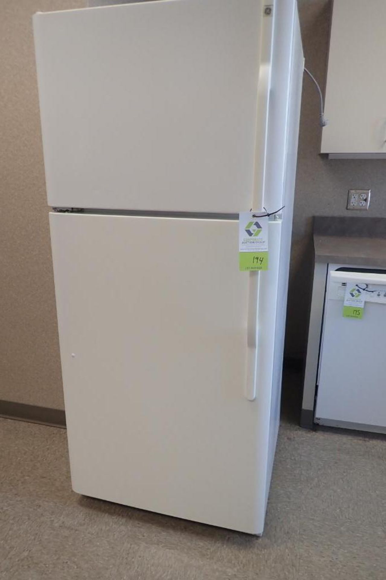 GE white refrigerator and freezer combo