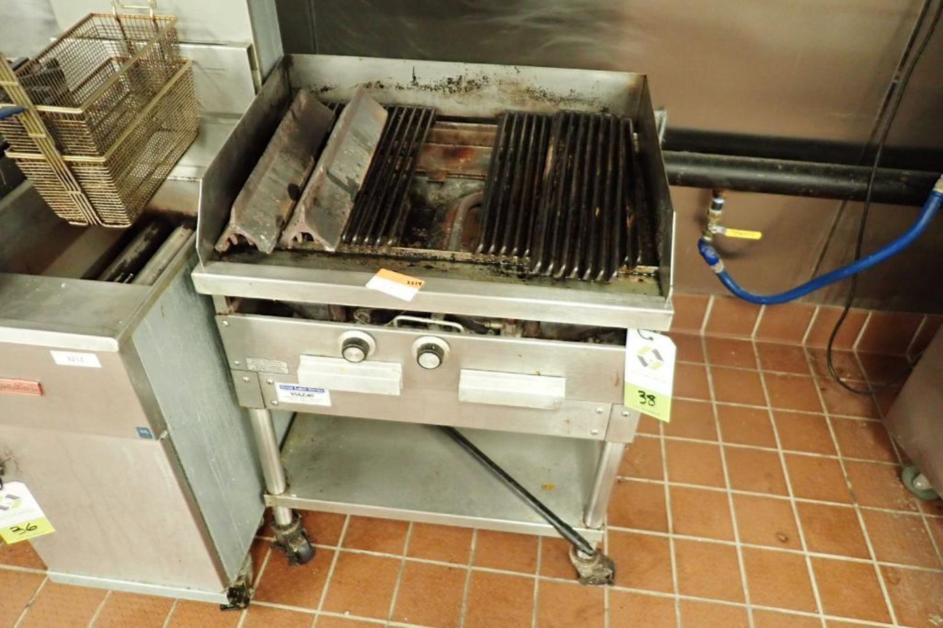 Vulcan grill, natural gas, 29 in. wide x 24 in. deep x 34 in. tall, on casters (bad)