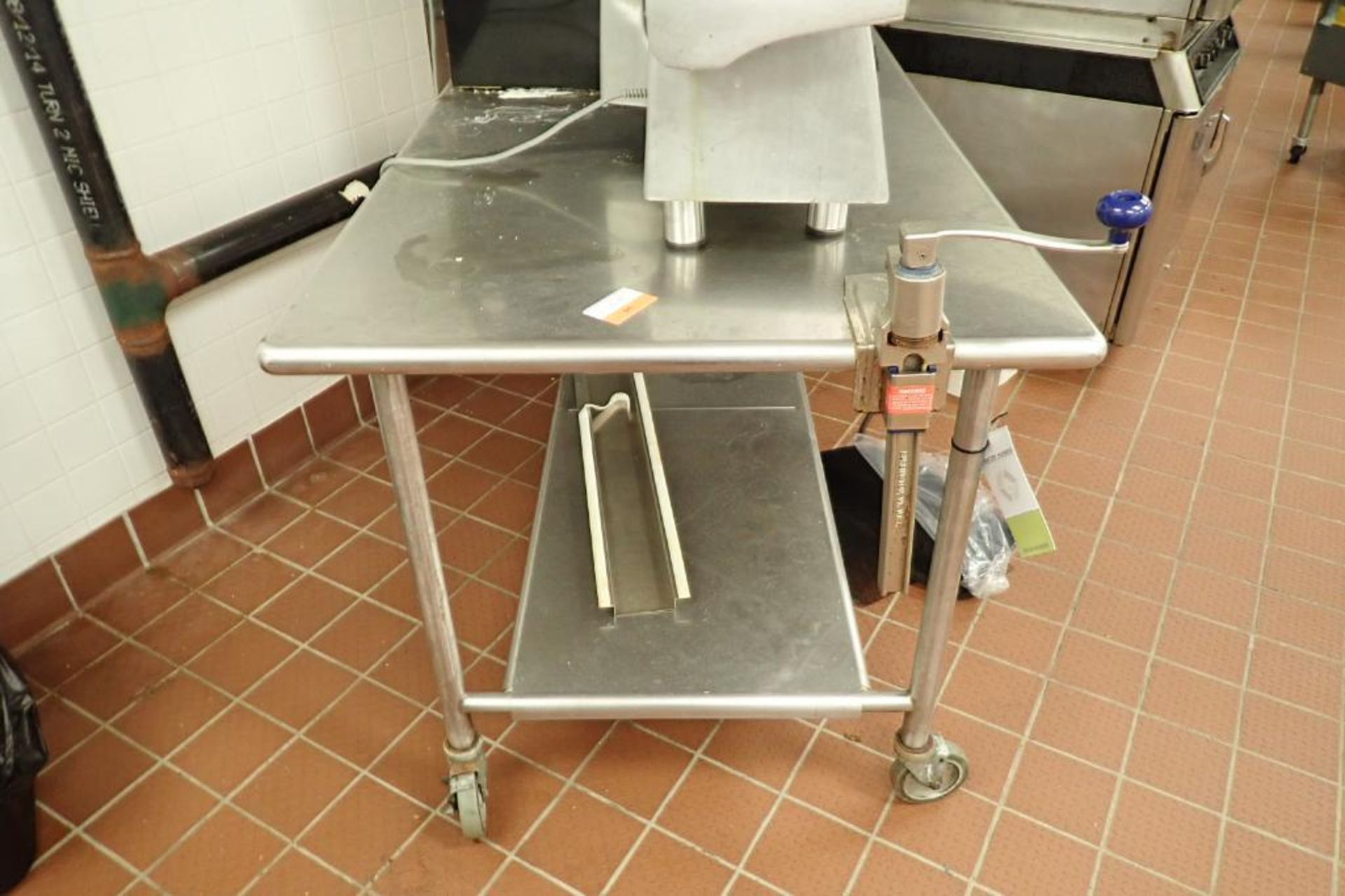 SS prep table, 72 in. long x 36 in. wide x 36 in. tall, on casters, with Edlund can opener - Image 3 of 4