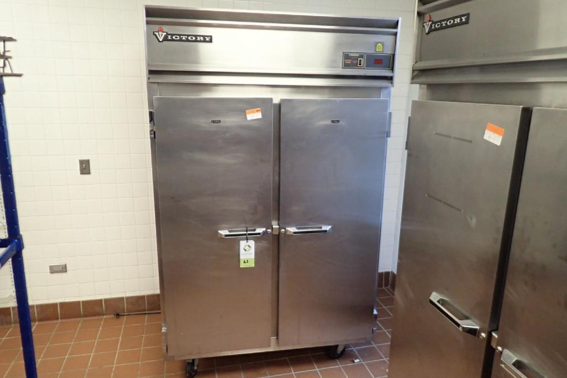 Victory 2 door freezer, Model FSA-2D-S7, SN H0271100, 52 in. wide x 32 in. deep x 84 in. tall, on ca