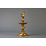 A large bronze disc candlestick or so-called 'heemskerk' candlestick, Low Countries, early 17th C.