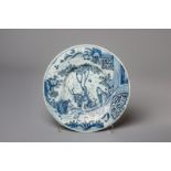 A Dutch Delft blue and white chinoiserie dish by Gerrit Kam, about 1700