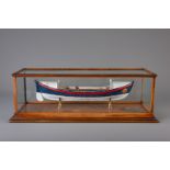 A painted wood model of the ship 'The Janet Hoyle' with glass case, 20th C.