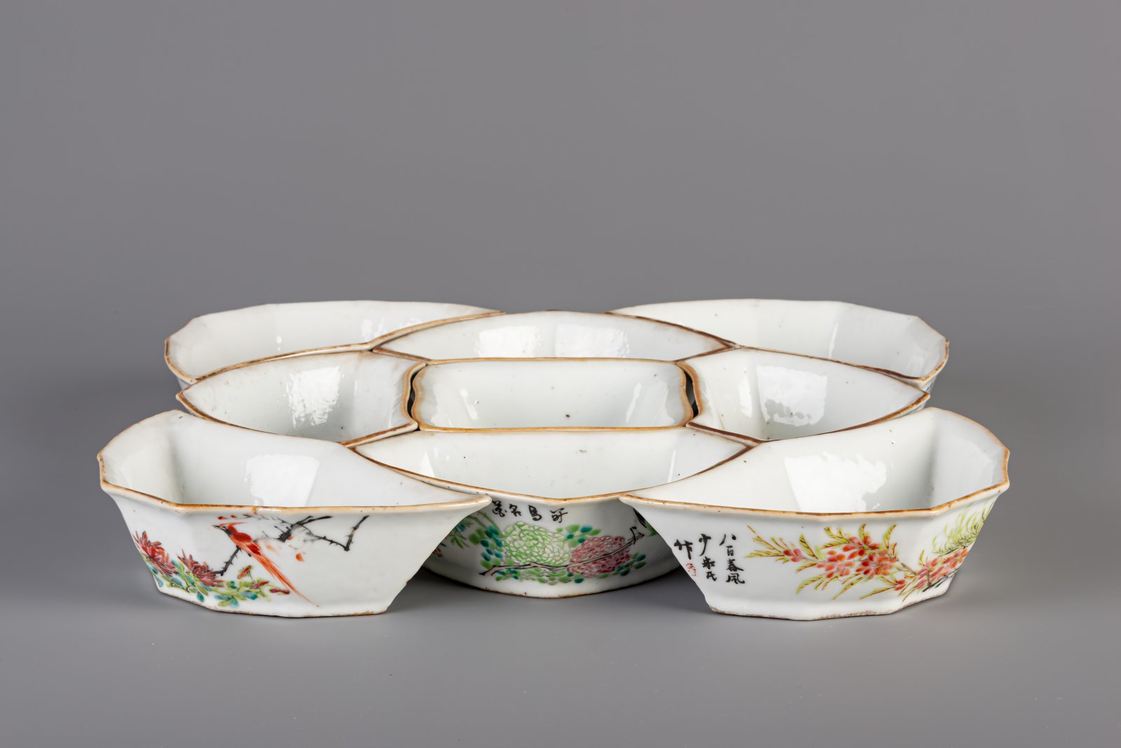 A Chinese famille rose sweetmeat or rice table set with birds among flowers, 19th C.