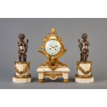 A Neoclassical three-piece gilt bronze mounted and white marble clock garniture, France, 19th C.
