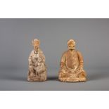 Two Chinese carved wood figures with traces of polychromie, 18th/19th C.