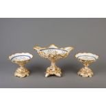 A three-piece Brussels porcelain armorial garniture, with 'J.B. Cappellemans ainŽ' mark, 19th C.