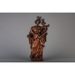 A large carved wood figure of Saint Joseph and Child, Flanders, 18th C.