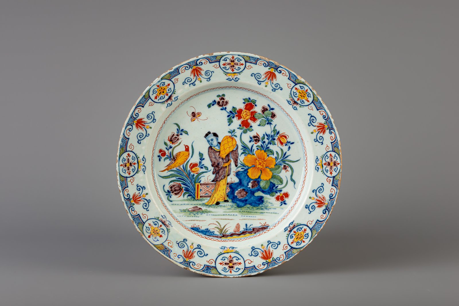 A Dutch Delft polychrome chinoiserie dish, early 18th C.