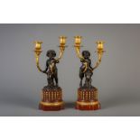 A pair of gilt bronze mounted Rouge griotte marble two branch candelabras, France, 19th C.