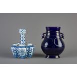 A Chinese monochrome purple hu vase and a blue and white tulip vase, 19th/20th C.