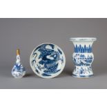 A Chinese blue and white zun vase, a brass mounted bottle vase and a dish, 18th/19th C.