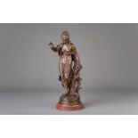 Auguste Moreau (1834-1917): A young lady with a bird, patinated bronze on a red marble base