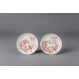 A pair of Japanese calligraphy saucer dishes for the Chinese market, Edo, 17th/18th C.