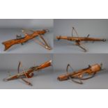 An exceptional collection of four crossbows in the medieval manner, 19th/20th C.