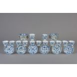 Seventeen Chinese blue and white cups and twenty-two saucers with floral design, Kangxi