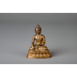 A Sino-Tibetan gilt bronze figure of Buddha, 18th/19th C.