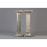 Two grey marble pedestals, 20th C.