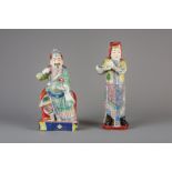 Two Chinese famille rose figures of dignitaries, 19th C.