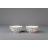A pair of Chinese famille rose bowls with flowers and bats, Guangxu mark, 19th/20th C.