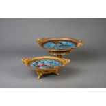 Two gilt mounted footed Japanese cloisonne chargers with birds, Meiji, late 19th C.