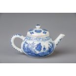 A Chinese blue and white teapot and cover with figures in a landscape and flowers, Kangxi