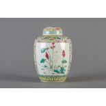 A Chinese famille rose ginger jar and cover with floral design, 19th C.