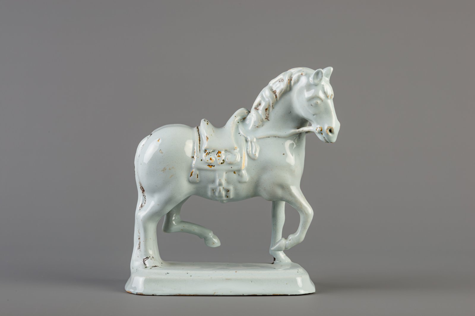 A large Dutch Delft white model of a standing horse, 18th C.