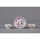 A Chinese famille rose 'rooster' saucer and two cups, Yongzheng