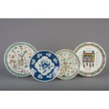 Three Chinese famille rose chargers and a blue and white charger, 19th C.