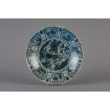 A large Chinese blue and white Swatow charger with a phoenix, Ming