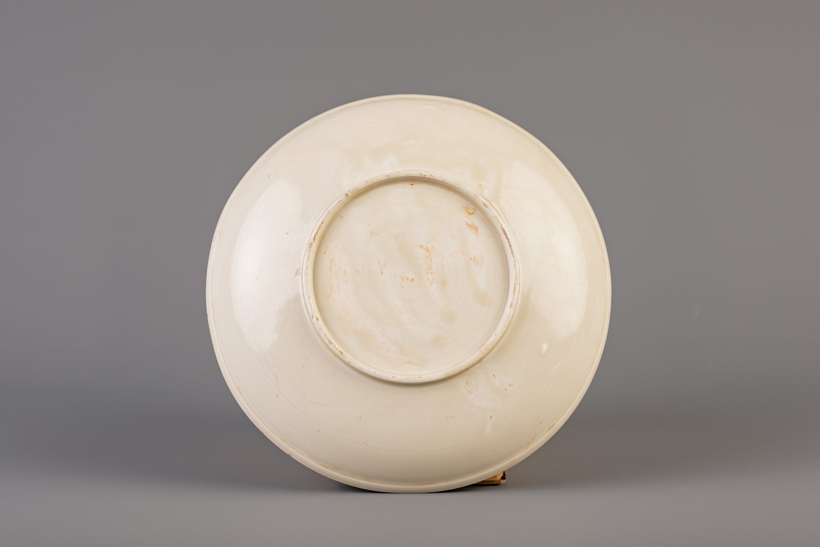 A Chinese carved white glazed dingyao dish, Ming or later - Image 2 of 2