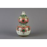 A Chinese famille verte double gourd vase, 19th C.