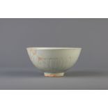 A Chinese anhua decorated celadon bowl, Ming