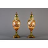 A pair of gold layered green ground decorative vases in Svres style, France, 19th C.