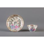 A rather rare Chinese famille rose cup and saucer with two ladies and a cupid, Qianlong