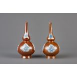 A pair of Chinese Batavian ware blue and white Islamic market sprinklers, Qianlong