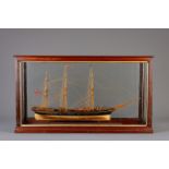 A painted wood model of the ship 'Alma' with glass case, 20th C.