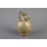 A celadon glazed jug, South-East Asia, possibly 17th/18th C.