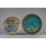Two large Japanese cloisonne chargers with various designs, Meiji, 19th/20th C.