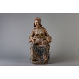 A polychrome decorated terracotta group of mother and child, probably the Netherlands, 19th/20th C.