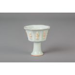 A Chinese celadon 'Immortals' stem cup, 19th/20th C.
