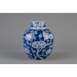 A Chinese blue and white covered ginger jar with prunus on cracked ice, 19th C.