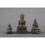 Three bronze figures of Buddha, Southeast Asia, 19th C.