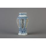 A Chinese blue and white reticulated double walled vase, Kangxi