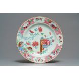 A Chinese famille rose dish with quails, butterflies and flowers, Yongzheng/Qianlong