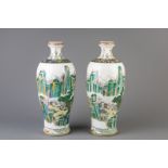 A pair of Chinese meiping vases with a landscape design, 20th C.