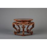A Chinese rootwood top carved wood stand, 19th/20th C.