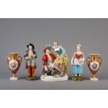 Two figures, Jacob Petit, a group and a pair of vases in polychrome porcelain, 19th and 20th C.