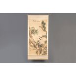 A Chinese silk scroll painting with a crane among pines, signed, 19th/20th C.